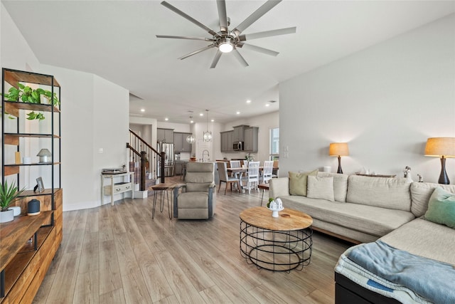 29510 Enchanted Breeze Ln, Katy, TX 77494 - living area featuring ceiling fan, light wood-style floors, recessed lighting, and baseboards