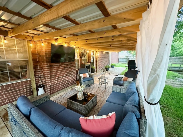 1308 Hagan St, Crockett, TX 75835 - fenced backyard featuring an outdoor hangout area and a patio