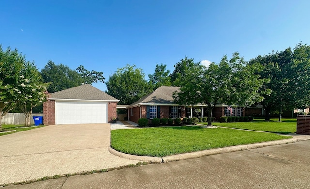 1308 Hagan St, Crockett, TX 75835 - view of front of property with a garage and brick siding