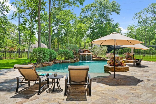 77 Big Trl, Missouri City, TX 77459 - view of pool with a patio area and view of wooded area