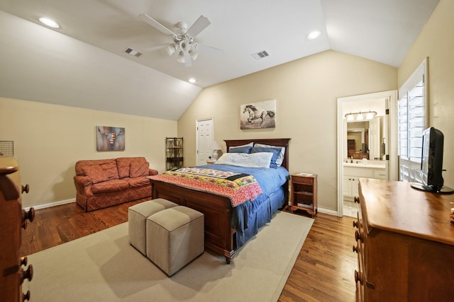77 Big Trl, Missouri City, TX 77459 - bedroom with lofted ceiling, wood finished floors, recessed lighting, ceiling fan, and connected bathroom
