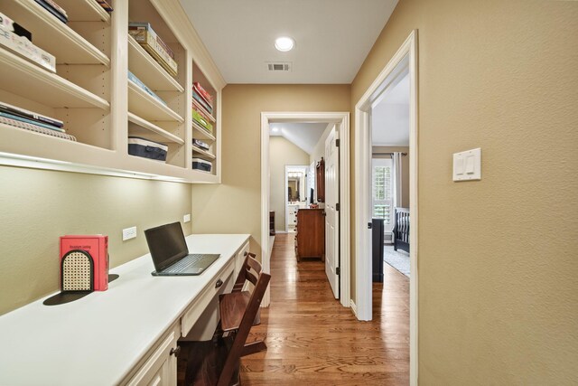 77 Big Trl, Missouri City, TX 77459 - office area featuring light wood-style flooring and built in desk