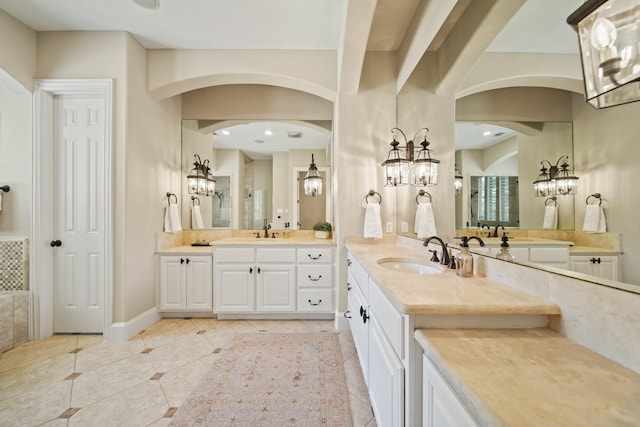 77 Big Trl, Missouri City, TX 77459 - full bath featuring tile patterned flooring, two vanities, a chandelier, and recessed lighting