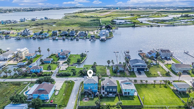 1401 103rd St, Galveston, TX 77554 - aerial view of residential area with a large body of water