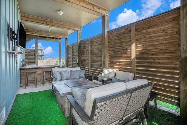 1401 103rd St, Galveston, TX 77554 - view of patio featuring outdoor lounge area