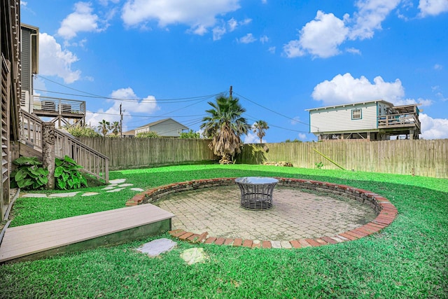 1401 103rd St, Galveston, TX 77554 - view of yard featuring a patio area
