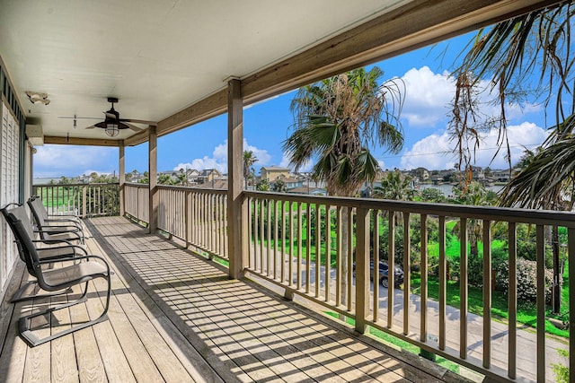 1401 103rd St, Galveston, TX 77554 - wooden deck featuring a ceiling fan