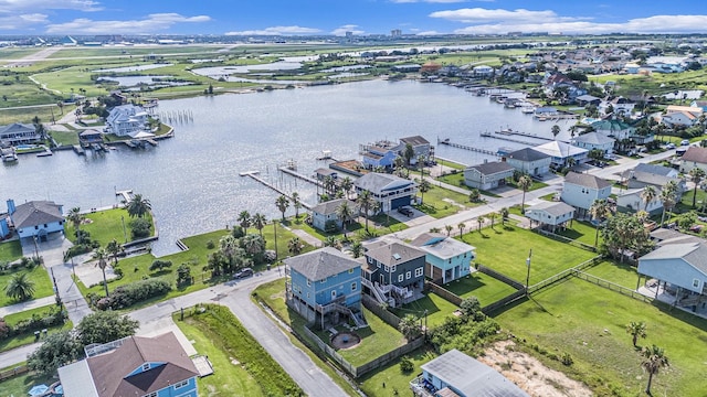 1401 103rd St, Galveston, TX 77554 - aerial view of residential area with a large body of water