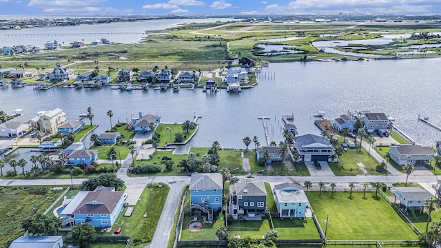 1401 103rd St, Galveston, TX 77554 - aerial view of residential area featuring a large body of water