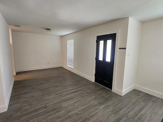 3511 Coltwood Dr, Spring, TX 77388 - entrance foyer with dark wood-style flooring and baseboards