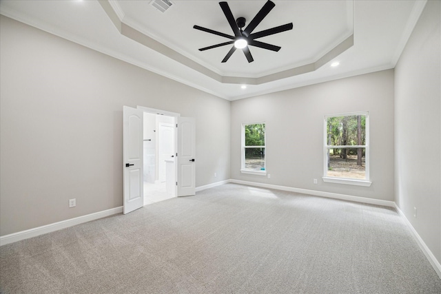 26800 Saddle Horn, Waller, TX 77484 - empty room with a raised ceiling, crown molding, carpet floors, a ceiling fan, and baseboards