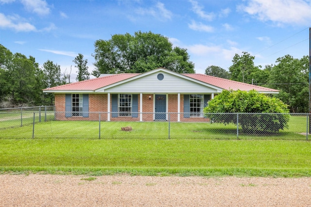2715 Tinkler St, Rock Island, TX 77470 - ranch-style house with metal roof, brick siding, and a porch