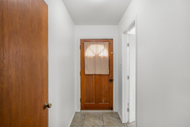 2715 Tinkler St, Rock Island, TX 77470 - doorway to outside with baseboards