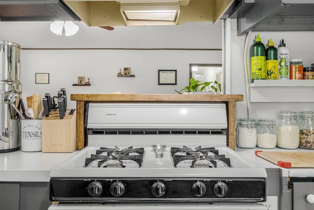 2715 Tinkler St, Rock Island, TX 77470 - kitchen view of white gas range oven and light countertops