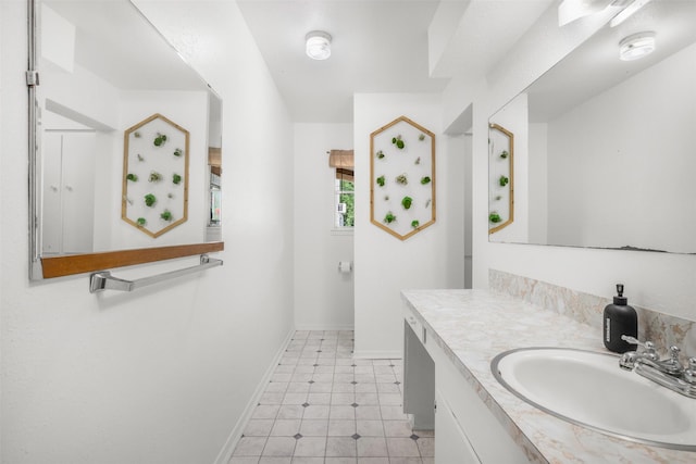 2715 Tinkler St, Rock Island, TX 77470 - bathroom with vanity and baseboards