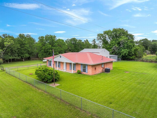 2715 Tinkler St, Rock Island, TX 77470 - view of front of house with brick siding and central air condition unit