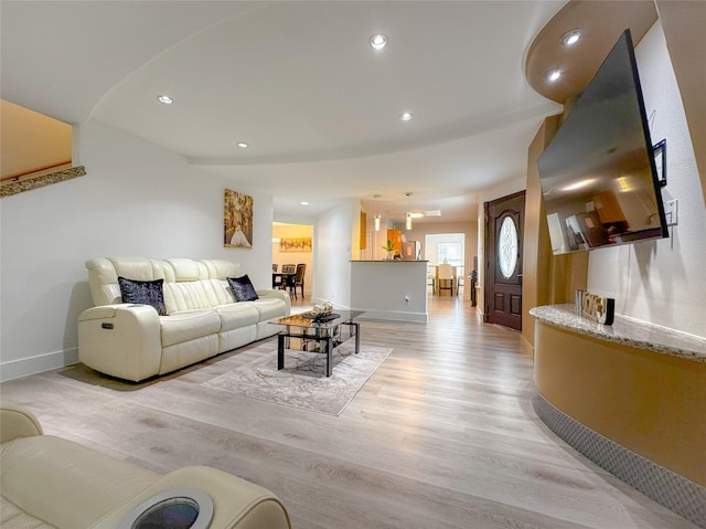 18323 River Sage Dr, Houston, TX 77084 - living room featuring baseboards, light wood-style flooring, and recessed lighting