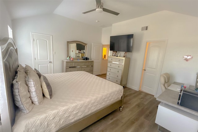 18323 River Sage Dr, Houston, TX 77084 - bedroom featuring vaulted ceiling, wood finished floors, and ceiling fan