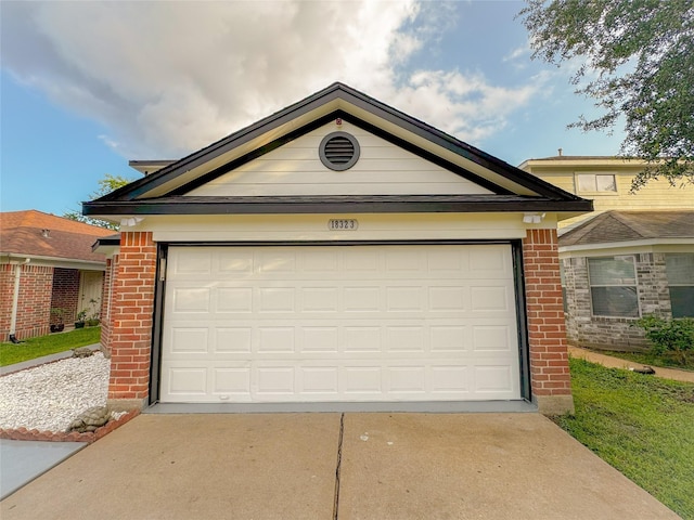 18323 River Sage Dr, Houston, TX 77084 - view of front facade featuring brick siding and concrete driveway