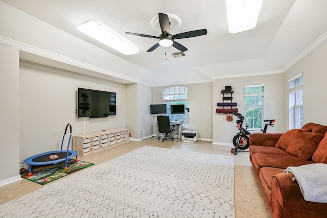 2803 Canyon Dr, Pearland, TX 77584 - living area featuring a ceiling fan, healthy amount of natural light, a raised ceiling, and crown molding