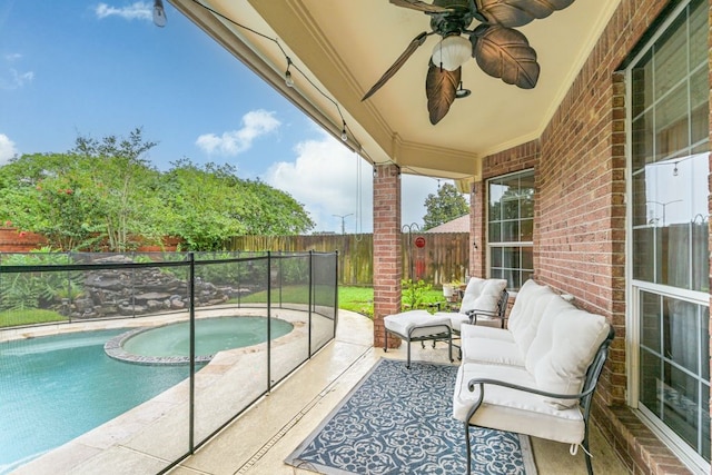 2803 Canyon Dr, Pearland, TX 77584 - view of swimming pool with a fenced backyard, ceiling fan, a pool with connected hot tub, and a patio