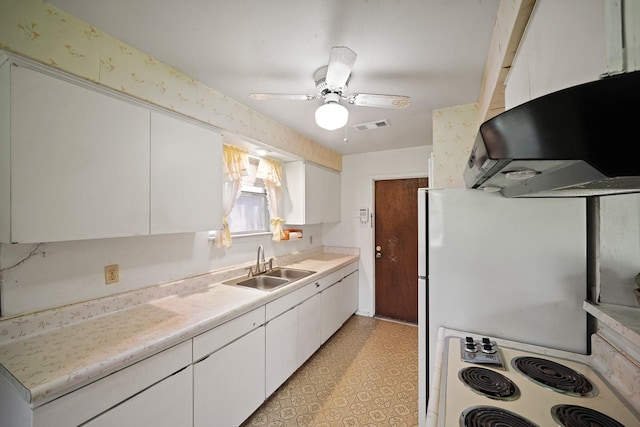 6027 Dellfern Dr, Houston, TX 77035 - kitchen with stove, extractor fan, light countertops, a sink, and ceiling fan