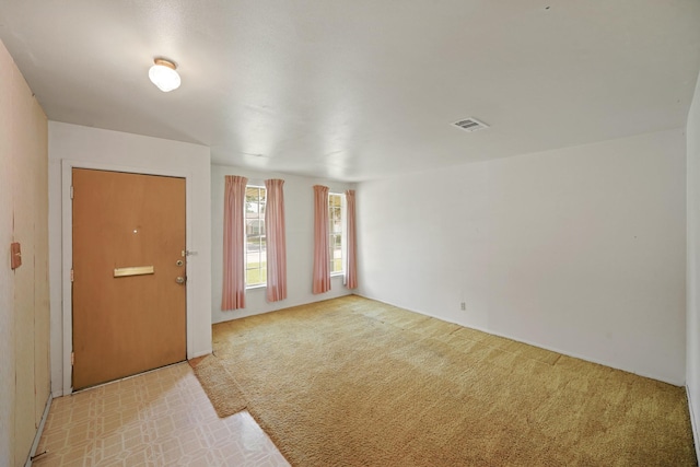 6027 Dellfern Dr, Houston, TX 77035 - foyer with light colored carpet