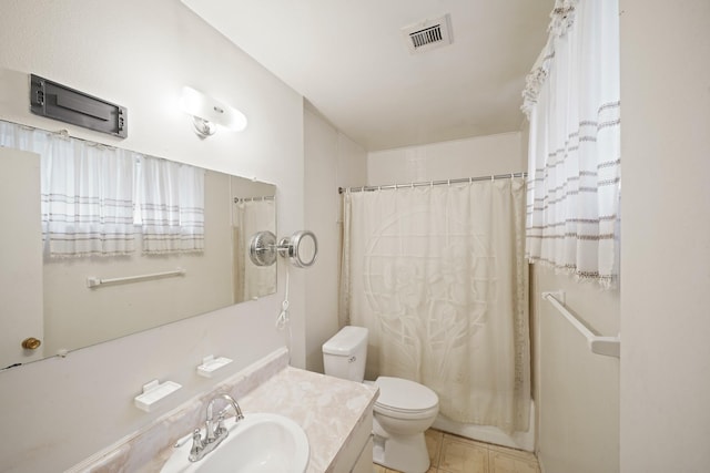 6027 Dellfern Dr, Houston, TX 77035 - bathroom featuring vanity, toilet, tile patterned floors, and shower / bath combination with curtain