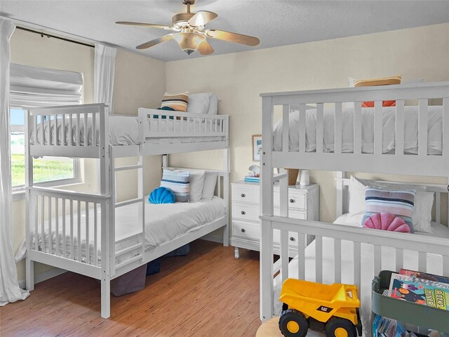 753 Bluewater Hwy, Surfside Beach, TX 77541 - bedroom featuring wood finished floors and ceiling fan