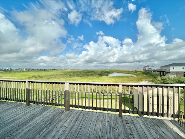 753 Bluewater Hwy, Surfside Beach, TX 77541 - wooden terrace with a water view