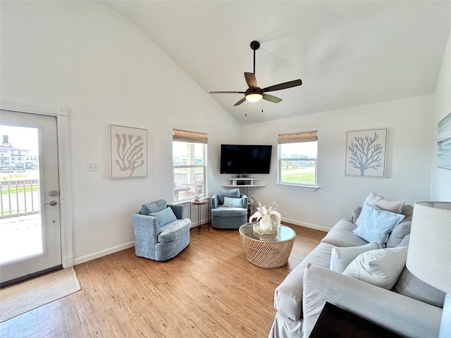 753 Bluewater Hwy, Surfside Beach, TX 77541 - living area featuring high vaulted ceiling, ceiling fan, wood finished floors, and baseboards
