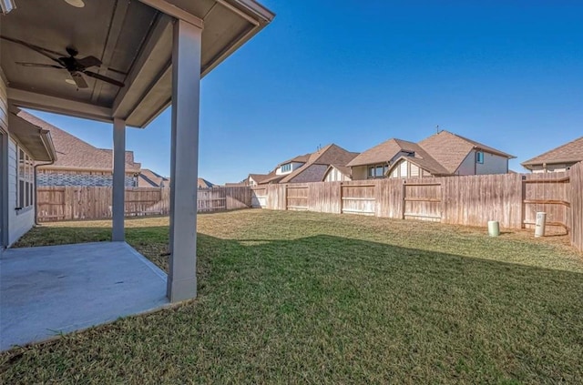 1330 Munson Valley Rd, Richmond, TX 77406 - view of yard featuring a ceiling fan, a residential view, and a patio area