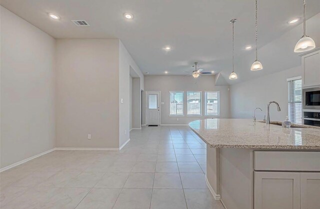 1330 Munson Valley Rd, Richmond, TX 77406 - kitchen with open floor plan, a sink, appliances with stainless steel finishes, ceiling fan, and recessed lighting
