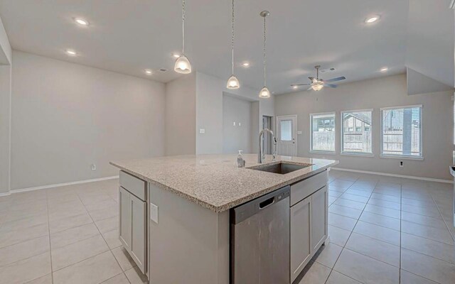1330 Munson Valley Rd, Richmond, TX 77406 - kitchen with dishwasher, a sink, open floor plan, light tile patterned flooring, and an island with sink