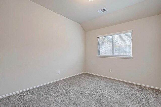 1330 Munson Valley Rd, Richmond, TX 77406 - unfurnished room with carpet flooring, lofted ceiling, and baseboards