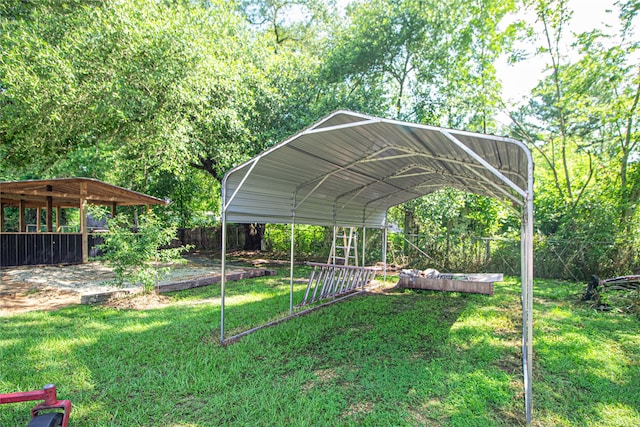 277 Lucy, Livingston, TX 77351 - view of yard with a detached carport