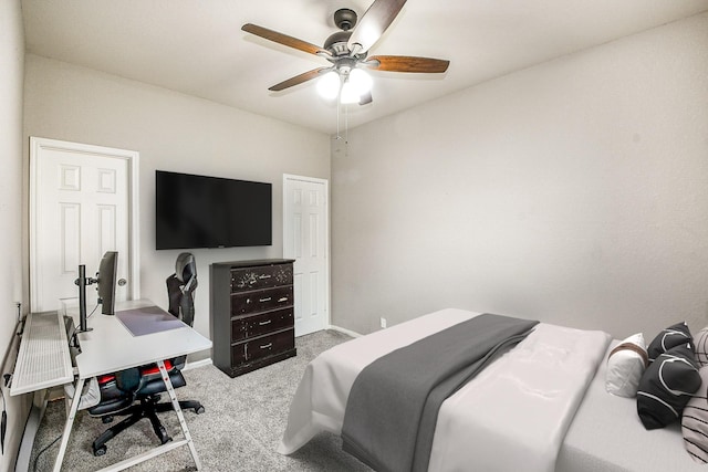 11019 Chestnut Path Way, Tomball, TX 77375 - carpeted bedroom with baseboards and a ceiling fan
