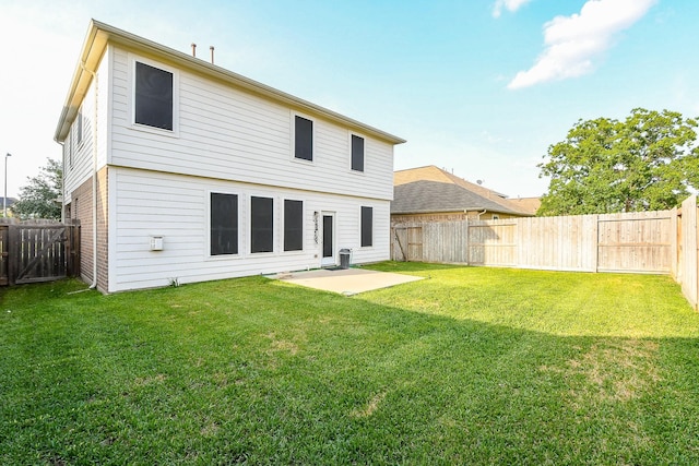 11019 Chestnut Path Way, Tomball, TX 77375 - rear view of house with a patio area