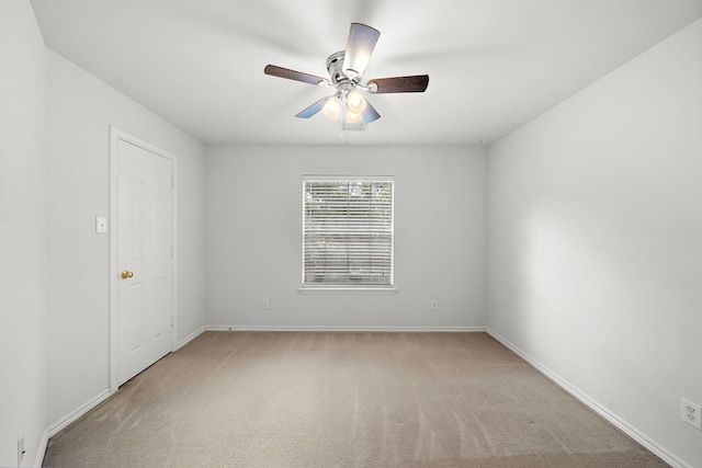 114 N Camellia Grove Cir, The Woodlands, TX 77382 - carpeted spare room with a ceiling fan and baseboards