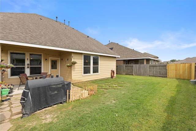 13610 Spectacled Bear Ln, Crosby, TX 77532 - view of yard featuring a patio area