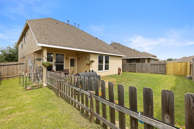 13610 Spectacled Bear Ln, Crosby, TX 77532 - back of house featuring a shingled roof