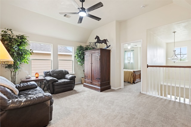 13610 Spectacled Bear Ln, Crosby, TX 77532 - living area with ceiling fan, light carpet, vaulted ceiling, and baseboards