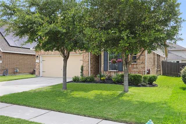 13610 Spectacled Bear Ln, Crosby, TX 77532 - view of property hidden behind natural elements with concrete driveway, a garage, and brick siding