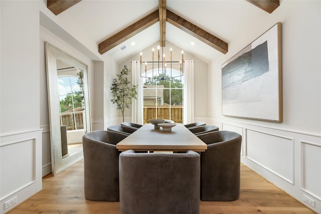 1611 Richelieu Ln, Houston, TX 77018 - dining room with a decorative wall, plenty of natural light, a chandelier, light wood finished floors, and a wainscoted wall