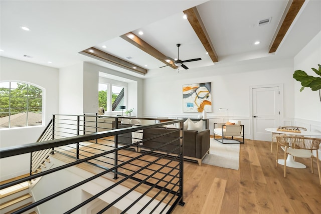 1611 Richelieu Ln, Houston, TX 77018 - hall with an upstairs landing, light wood finished floors, beamed ceiling, wainscoting, and recessed lighting
