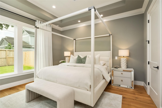 1611 Richelieu Ln, Houston, TX 77018 - bedroom with ornamental molding, light wood-style flooring, and recessed lighting