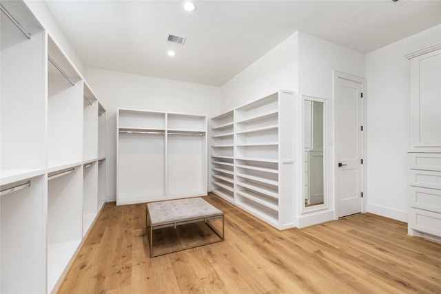 1611 Richelieu Ln, Houston, TX 77018 - spacious closet featuring light wood-type flooring