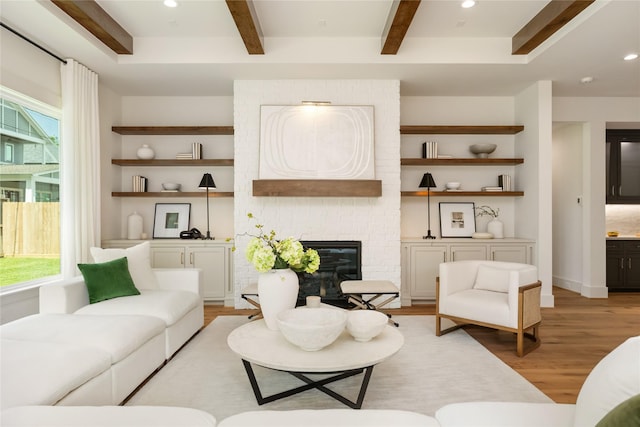1611 Richelieu Ln, Houston, TX 77018 - living room with light wood-style floors, beam ceiling, a brick fireplace, and recessed lighting