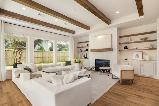 1611 Richelieu Ln, Houston, TX 77018 - living room with light wood-style floors, a fireplace, beamed ceiling, and recessed lighting