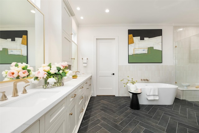1611 Richelieu Ln, Houston, TX 77018 - full bath featuring double vanity, a soaking tub, tile walls, ornamental molding, and recessed lighting